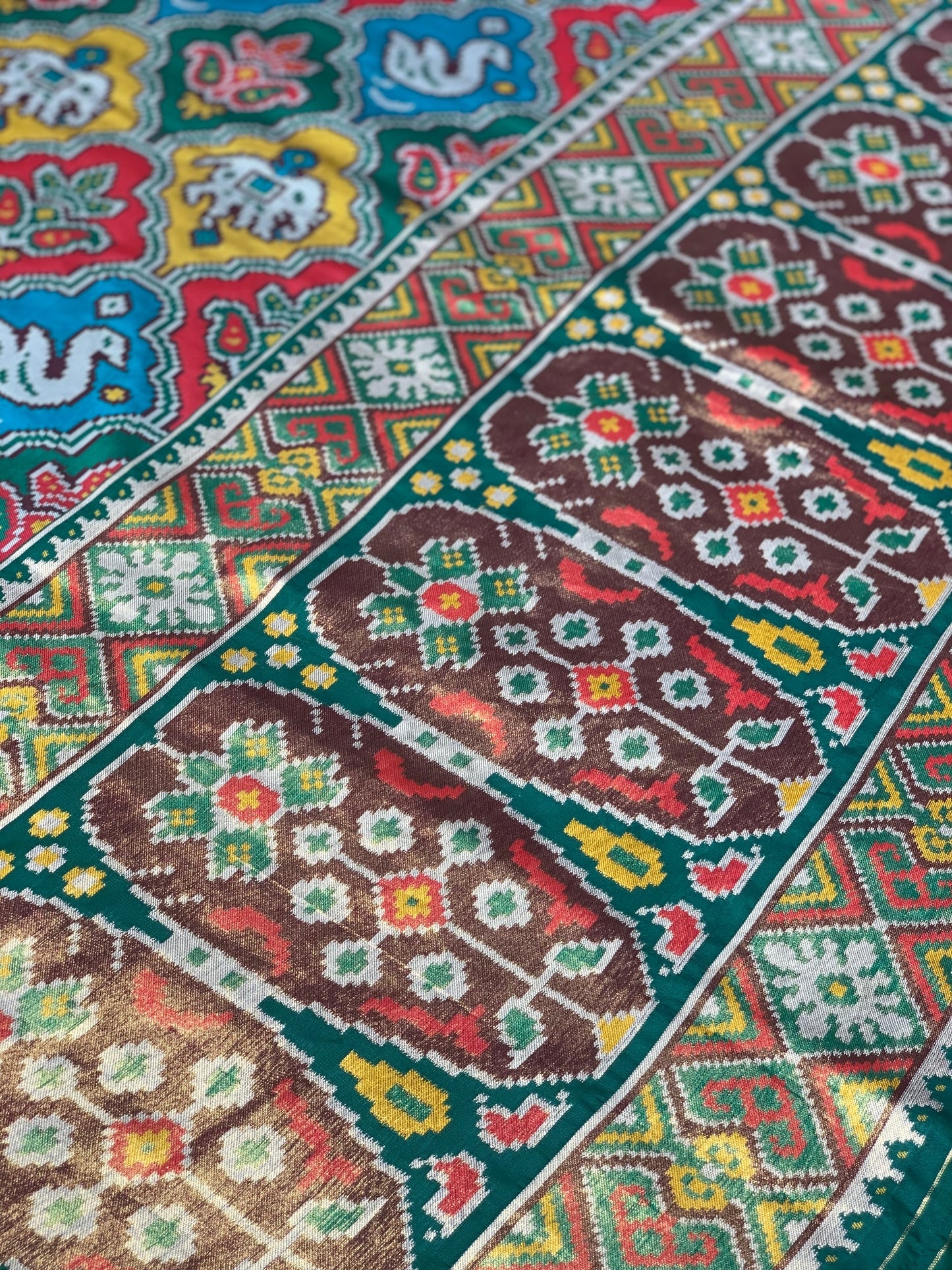 Green Base Multi Color Patola Animals Weave in Semi Silk