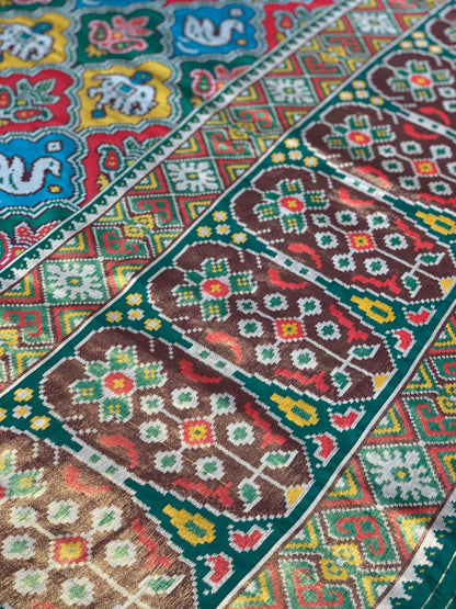 Green Base Multi Color Patola Animals Weave in Semi Silk