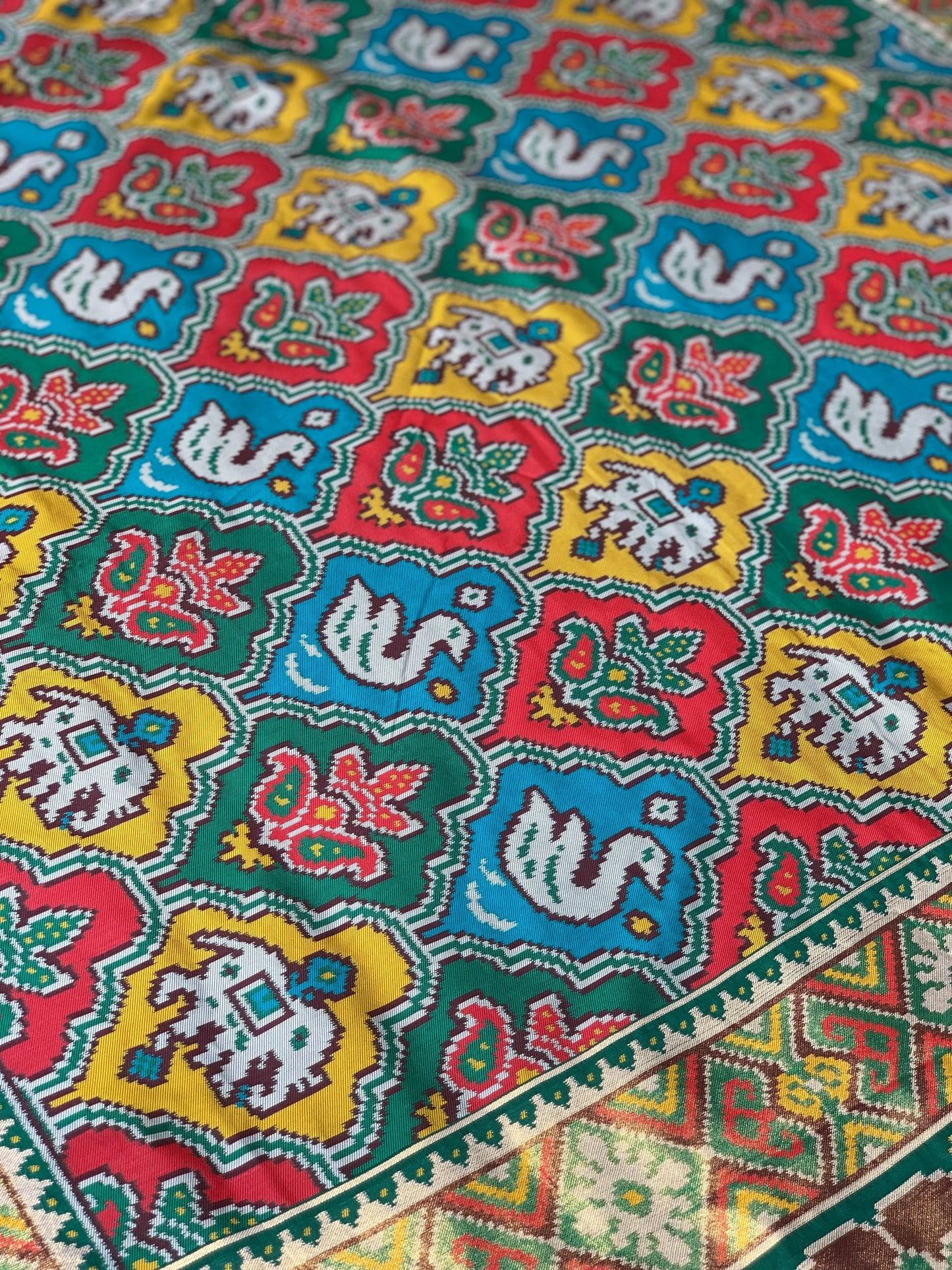 Green Base Multi Color Patola Animals Weave in Semi Silk