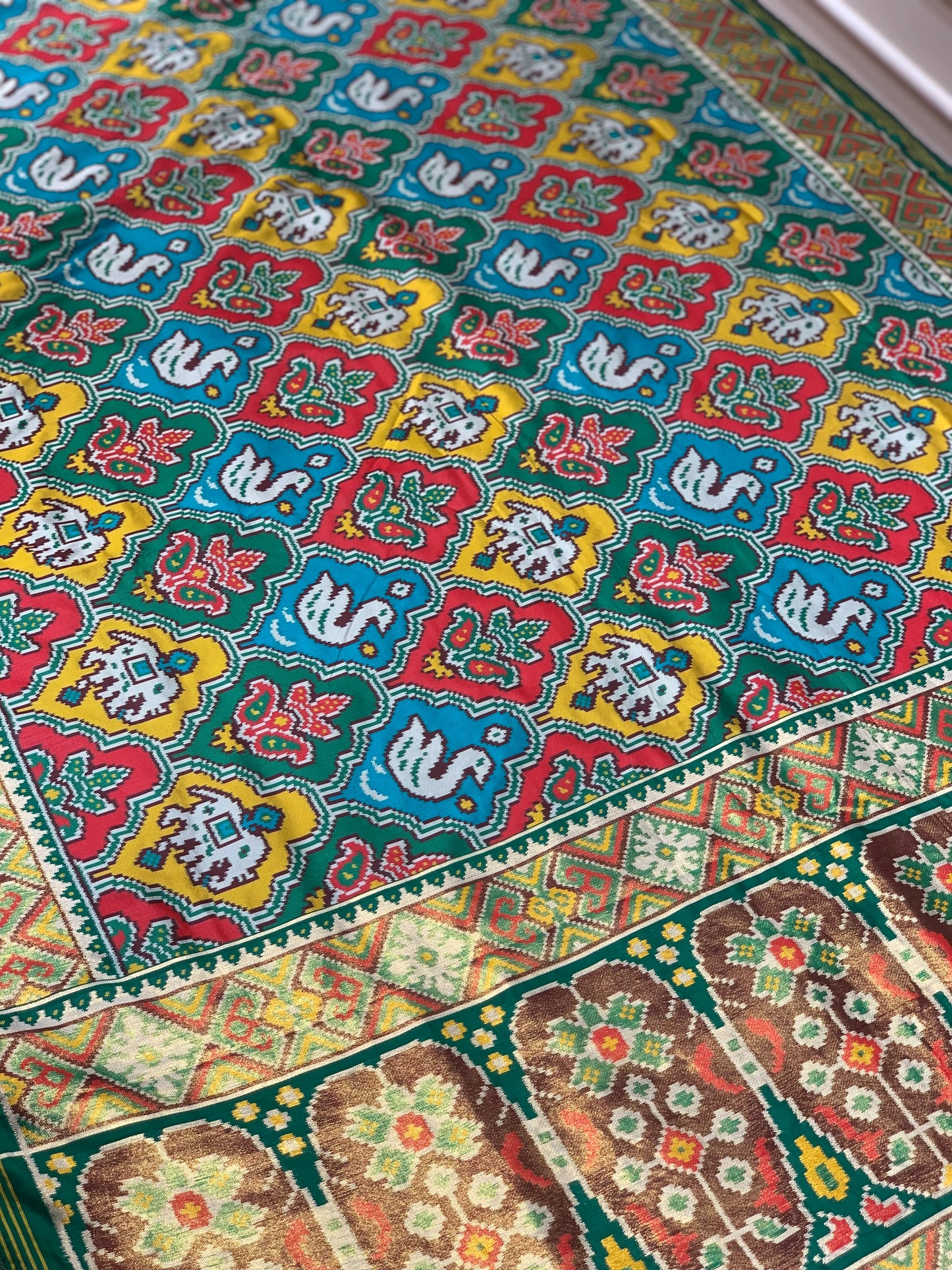 Green Base Multi Color Patola Animals Weave in Semi Silk
