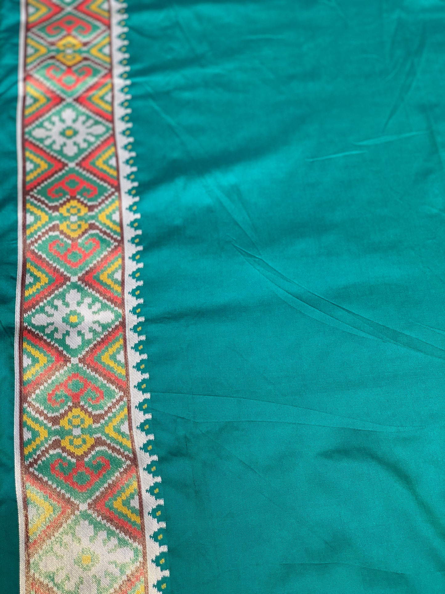 Green Base Multi Color Patola Animals Weave in Semi Silk